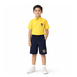 Boy wearing yellow short-sleeve school polo shirt with chest crest and navy shorts